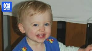 Table crushed playing toddler, coroner told