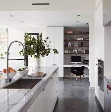 29 Concrete Floor Ideas We Found On Instagram Domino Concrete Kitchen Floor Concrete Floors Living Room Kitchen Living