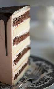 Chocolate Vanilla Tuxedo Cake With Rasperry Buttercream Recipe Chocolate And Vanilla Cake Tuxedo Cake White Chocolate Buttercream