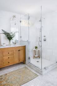 In some cases, especially in the bathroom, the marble tile of the floor can extend partially or all the way up the walls, continuing the pattern. 75 Beautiful Marble Floor Bathroom With Light Wood Cabinets Pictures Ideas August 2021 Houzz