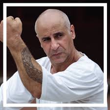 Who is Jiang Yu Shan (江玉山, Hisham Al-Haroun)