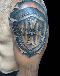 Among all the locations, shield tattoos are mostly done on arms as they are clearly visible. Top 70 Best Shield Tattoo Design Ideas For Men Armor Body Art Shield Tattoo Armour Tattoo Shoulder Armor Tattoo