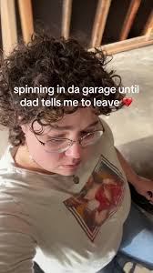 Guy in Tire Rolling Garage