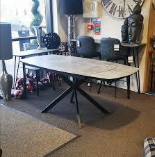 Our dining room furniture sets add a touch of elegance to your home and make you feel like you're fine dining every night. Mason Stone Twist Extending Dining Table X Leg Progressive Furnishings