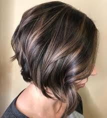 This light brown hair color and wavy bob hairstyle is a great look for summer! 70 Fabulous Choppy Bob Hairstyles Choppy Bob Hairstyles Hair Styles Short Hairstyles For Thick Hair