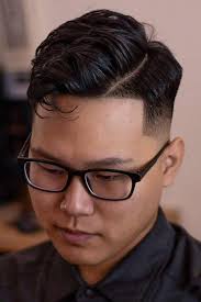 Korean males have a wide range of hair lengths, with some maintaining the generic male hair length and others challenging the female hair length. Korean Hairstyles Male Fashion Collection Menshaircuts Com