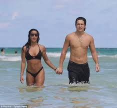 But don't expect it be his debut album just yet. Austin Mahone S Girlfriend Katya Henry In Tiny Black Bikini On The Beach In Miami Daily Mail Online
