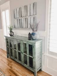 A dining room buffet is a supporting actor. How To Decorate A Dining Room Buffet Table Home By Kmb