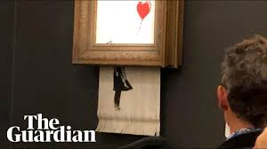 Banksy just delivered a masterclass in using technology to both create and comment on art. Banksy Artwork Self Destructs After Selling At Auction For 1m Youtube