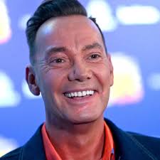 BBC Strictly's Craig Revel Horwood slips around in his speedos as he tries  to get into a hammock at £770 a night hotel