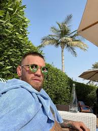 Louis vuitton conor mcgregor sunglasses. Conor Mcgregor Taunts Dustin Poirier By Donning Reflective Sun Glasses Featuring Ufc 178 Win Image Daily Mail Online