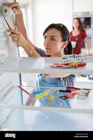 Refrigerator repair hi-res stock photography and images - Alamy