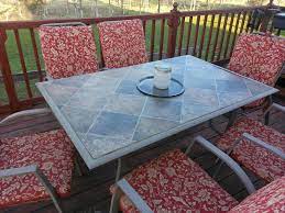 Replacing The Broken Glass On Our Patio Table Diy Patio Table Tile Patio Table Patio Table Redo