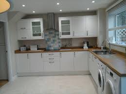 Handleless kitchen doors shaker kitchen doors modern kitchen doors traditional kitchen doors. White Shaker Kitchen Wood Worktop Novocom Top
