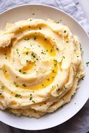 As soon as the potatoes are mashed, slowly whisk in enough of the hot butter mixture to make the potatoes very creamy. Perfect Mashed Potatoes Foodtasia