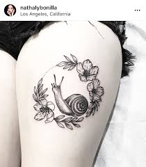 Cute blue color snail tattoo. 10 Woman Non Binary Tattoo Artists Across The U S For Your Next Meaningful Ink
