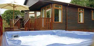Located in the heart of the suffolk countryside and great base for exploring many beautiful suffolk tourist attractions. Athelington Hall Log Cabins Suffolk Norfolk Life Magazine