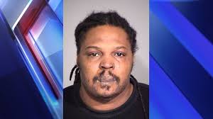 Police arrest suspect, seize drugs and guns