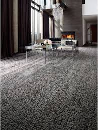 Similar to broadloom carpet shapes, homeowners are using carpet tiles to create shapes and designs through the layout of their tiles. Hospitality
