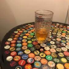 We started saving beer bottle caps and recruited our friends to save for us as well. Bottle Cap Table With Poured Resin Surface 9 Steps With Pictures Instructables