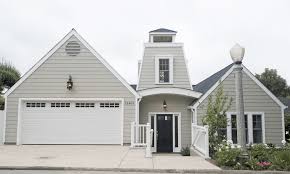 The coastal materials and color palette set the tone for comfortable gathering spaces inside and out. High Ceilings And A Great Room In A Magnificent Cape Cod Style Home Cococozy