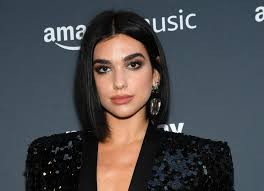 She made a powerful entry and speaking about her outfit for the special occasion, it was one of the most unique numbers. Dua Lipa Just Debuted Rose Gold Hair And She Looks So Different Hellogiggles