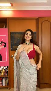 See more ideas about indian beauty, indian beauty saree, desi beauty. Anveshi Jain Looks Sizzling Hot In A White Saree With Red Blouse Flaunting Her Ample Cleavage Entertainstore