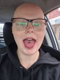 Just got my tongue pierced today! Looks good with the vertical labret 😋