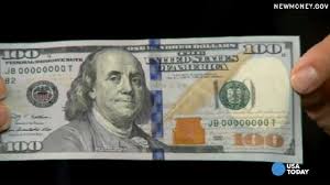 This ribbon is woven into the paper, not pasted on. New Currency Out Tuesday 411 On The New 100