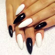 Professional modern black and white nail salon business card featuring word nails in modern calligraphy font style on front side and details in modern sans serif font style on back side. 50 Best Black And White Nail Designs Stayglam