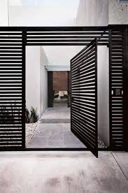 This picket fence, with its rounded gate, provides security for children and pets while adding a love the color choice and the way it looks with the copper accents. Stunning Gate Design Ideas Front Gate Designs Local Home Us Home Improvement