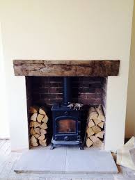 A Woodburning Stove In A Traditional Fireplace Contact Www Stovesonline For More Help With Design Small Wood Burning Stove Old Fireplace Fireplace Hearth