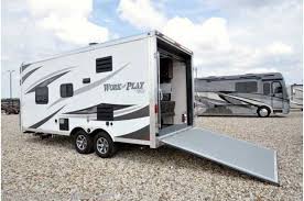 Across from the dinette there is a refrigerator, three b. 2016 Forest River Work And Play 18ec Toy Hauler For Sale W A C
