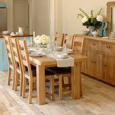 Instead of investing in a large island in a compact kitchen, try a smaller, decorative table or cart like this for extra storage and work space. Kitchen Table Decorating Ideas Decor