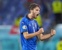 Italy's manuel locatelli celebrates after scoring the opening goal during the euro 2020 soccer championship group a match between italy and switzerland at the olympic stadium in rome, italy. E4nj7oy7enklpm