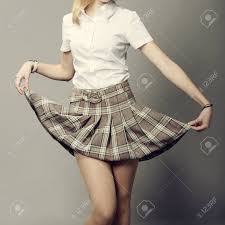 Maybe you would like to learn more about one of these? Jeune Femme Soulevant Sa Jupe Ecossaise Courte Banque D Images Et Photos Libres De Droits Image 25673162