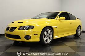 Image result for Yellow Devil 2004 Pontiac