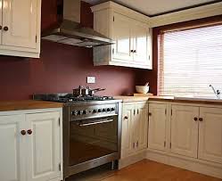 For the easy step, you can try if you are dealing with a lot of browns, earthy shades, or neutral colors in your kitchen, your best option is kitchen cabinets with soft white that will. Modern Colonial Feel With Pressform Doors Google Image Result For Http Www Glenwisekitchens Ie Image Kitchen Colors Brown Walls Kitchen Red Kitchen Walls