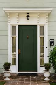 It's a nice subtle change from the traditional black or dark green, but still creates a beautiful contrast against a crisp white. White House With Gray Shutters And Blue Door Novocom Top