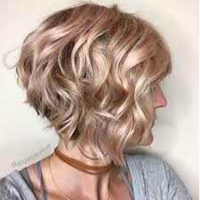 Selecting the appropriate bob hairstyle for you actually depends on your hair type and face shape. Wavy Inverted Bob With A Hint Of Pink Hair Styles Wavy Bob Haircuts Stacked Bob Hairstyles