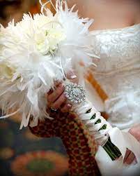 Ostrich plumes bring drama and movement to this bouquet of miltoniopsis orchids, double tulips, and tree peonies (a chinese flower once so highly revered that only the emperor could. Red Shoes Bridal December 2010 Wedding Bouquets Wedding Veil Vintage Bridal Brooch Bouquet