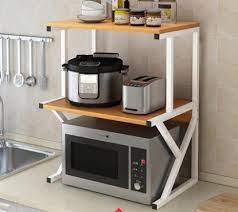A microwave oven is an oven that heats food with microwaves (a specific wavelength of radio waves). Cheap High Quality 3 Tier Wooden Stable Easy Assemble Microwave Oven Seasoning Storage Rack Kitchen Corner Shelf For Home Use Buy Cheap Microwave Oven Shelf 3 Tier Kitchen Corner Shelf Wooden Stable Kitchen Shelf Product