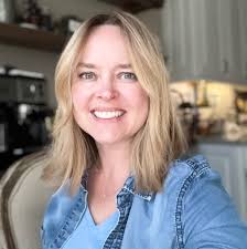 Where can I find a photograph of a Yellowstone sunset with orange sky and  mountains?