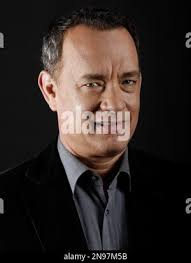 This Saturday, June 18, 2011 photo shows Kristen Burris, second from left,  and her husband Tony, second from right, as they sit with their two sons  Colton, 3, left, and Jackson, 5,