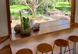 The building consists of an open kitchen / living room, one bedroom with double bed, and one bathroom. Stunning Boho Style Tiny House Comes With Open Air Bar