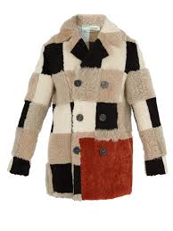 Plain and solid fabrics as well as prints where the predominent colour is white but with other colours present. Off White Surreal Check Patchwork Shearling Coat In Beige Modesens