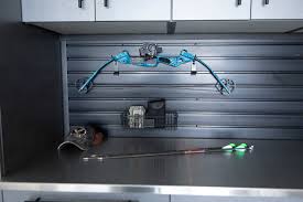 Make better use of your garage's space and get things off the floor with this diy project. The Perfect Garage Workshop For Fishing And Hunting Gorgeous Garage