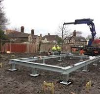 Screw pile foundations for compact housing solution - Ground ...