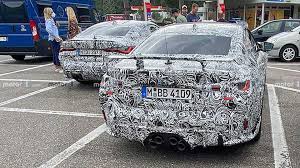 Hotter Bmw M4 Spied Boasting Big Rear Wing Stacked Exhausts