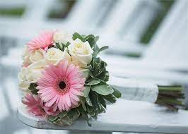 Bridemaids in different neutral dresses and cowboy. Pink Gerberas And White Roses Gerbera Wedding Bouquets Bride Bouquet Pink Wedding Flower Packages